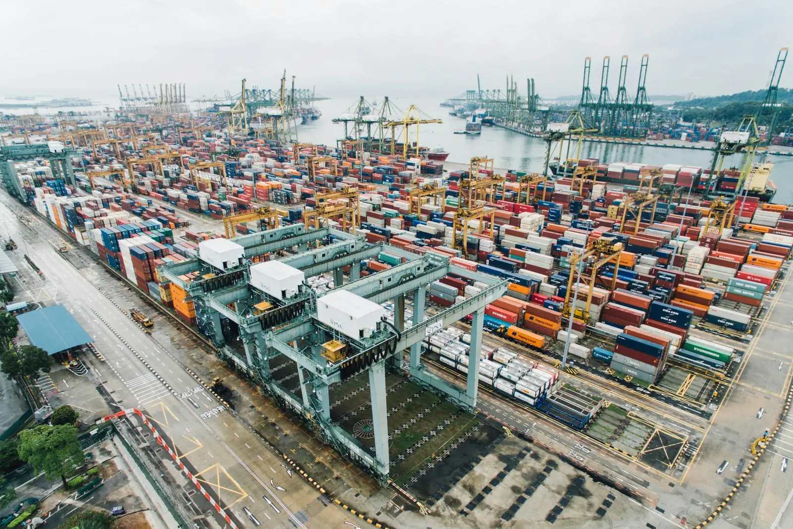 Container terminal with gantry cranes and stacked containers