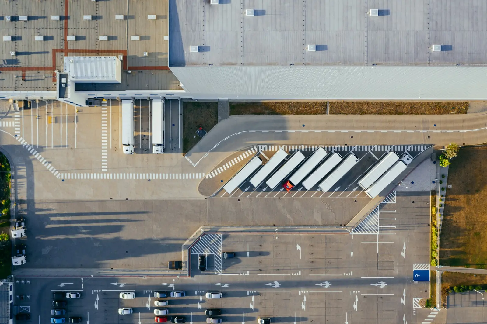 Aerial view of trailers parked at a logistics yard
